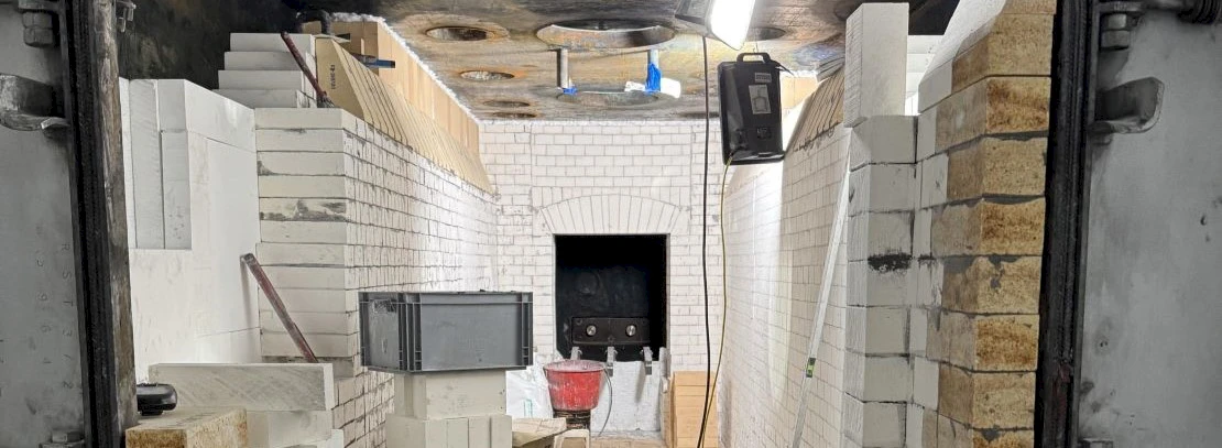 Interior of an industrial furnace system under construction